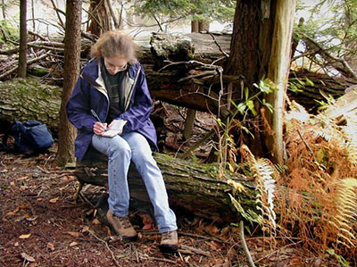 Zhanna signs the logbook...