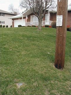 The marker, the witness sign on the pole, and 602 Church Street in the background.