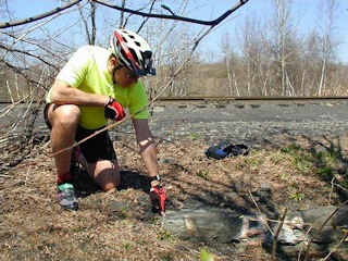 Rich points out the mark on the corner of the south parapet of the culvert.