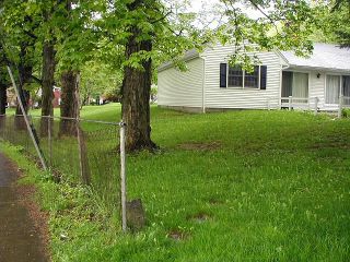 The house nearest the marker.