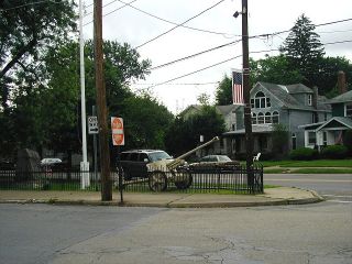 The memorial plot and white flagpole, seen from Linden Street.