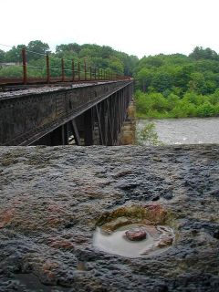 The disk was once here, in the southwest end of the northwest bridge abutment.