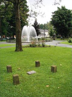 The benchmark, surrounded by its court.