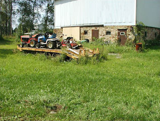 Farm equipment that hasn’t moved in quite some time.