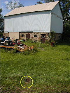 Orientation view, south of east corner of barn, mark indicated.