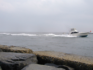 If it hadn’t been raining, I would’ve stayed longer to watch the boats in the inlet.