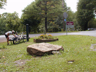 View showing boulder, N 192, and sign at park entrance.