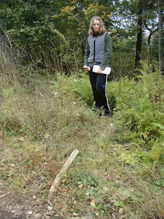 Zhanna stands near the remnants of the airway beacon.