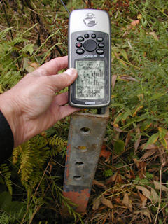 South leg anchor, GPS antenna positioned at center of tower base.