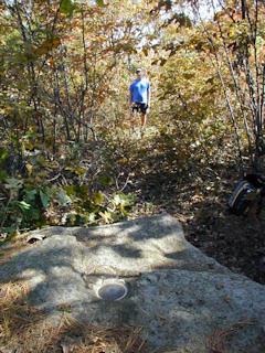 Looking east; Rich stands at the trail.