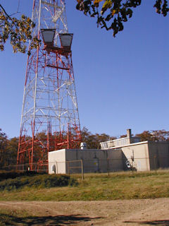 The bottom of the tower and fenced-off area.