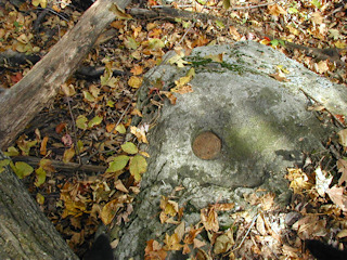 Eyelevel view of the mark on the rock outcrop.