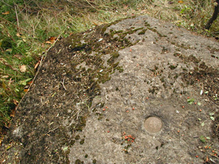 Eye-level view of the mark on the boulder.