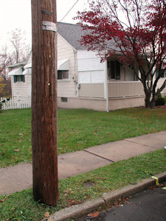 Facing NE and No. 204 E. Lehigh Street. Shown is powerline pole 16484/52047/24700.