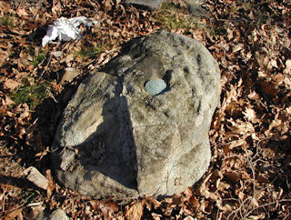 Eye-level view of the boulder and station mark.