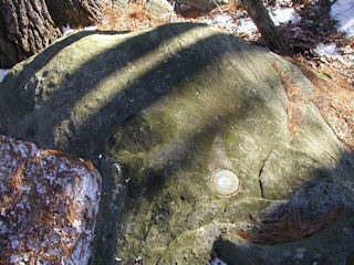 Eyelevel view of the mark on the boulder.