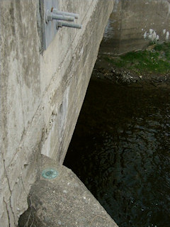 Eye-level view of the mark on the wingwall.