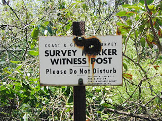 The sign on the witness post.