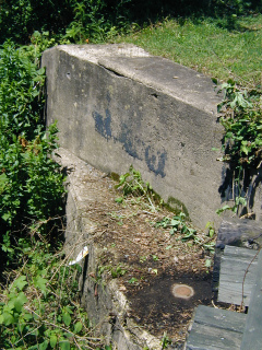 The shelf into which the mark is set is well below the level of the rail.