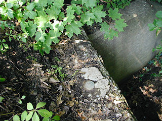 Eye-level view of the mark on culvert headwall.