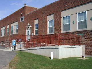 This new ramp probably took the place of the old basement entranceway that held the reference mark.