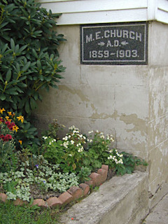 Plaque showing the former name of this church.