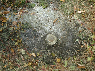 Eyelevel view of the station disk set in boulder.