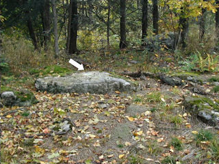 The placement of the mark on the boulder.