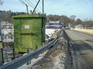 The location of the disk, on the bridge adjacent to a USGS gaging station, is indicated.