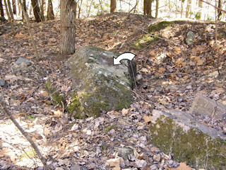 Looking northeast from the intersection toward the boulder in its current location.