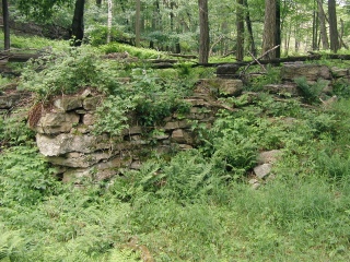 This is part of the ruin referred to in the datasheet diagram, just south of the mark.