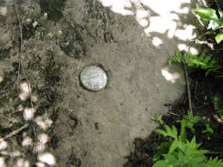 Eyelevel view of the mark on the boulder.