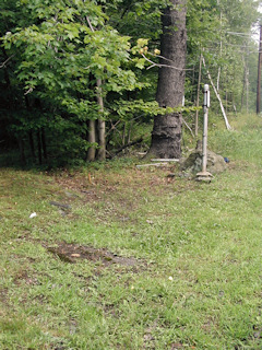 Looking N, toward witness post near intersection of State Route 2013 and West Plank Road.