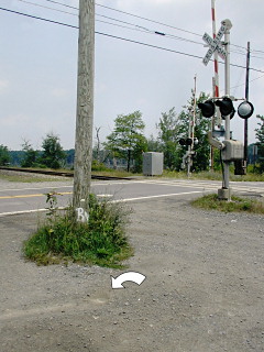 Looking NE at Route 507, tracks, and power pole.