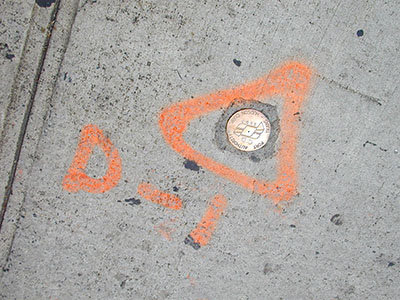 Eyelevel view of the disk on the sidewalk