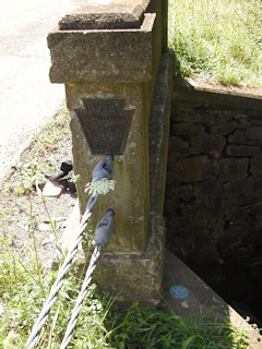 The bridge is marked with a 1936 PDH keystone plaque.