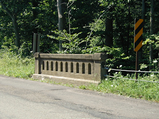 The bridge is an example of the typical style of concrete bridge from the 1930s.