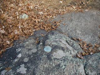 Eyelevel view of the reference mark set in the rock outcrop.