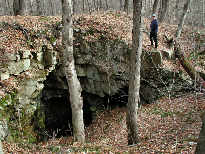 Rich carefully approaches the same mine shaft.