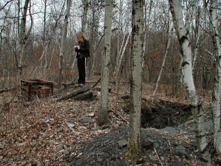 Zhanna photographs the bat gate