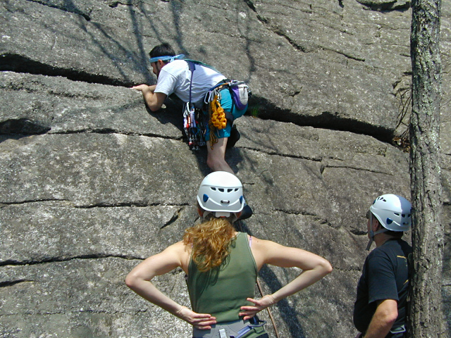 John sets up the rope as Zhanna and Rich look on anxiously.