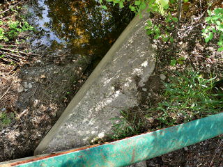 Southeast wingwall, broken concrete.