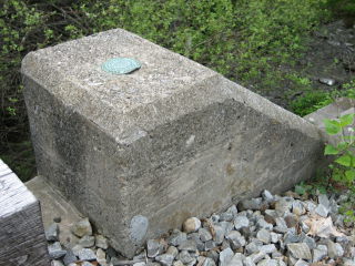 Eyelevel view of mark on bridge wingwall.