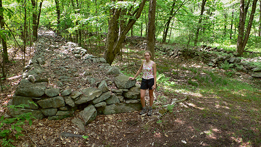 “Broadway” travels between these two very wide stone walls.