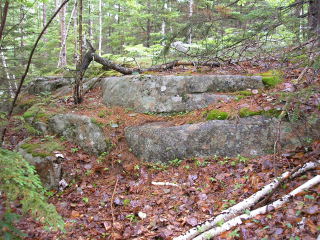 A slightly more distant view of the outcrop. The mark was well-buried and not easy to spot.