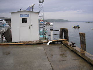 The tide gauge station adjacent to the mark.