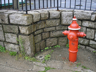 This disk is easy to find, right at the edge of this little alcove along Main Street.