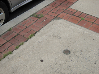 The disk is just a few feet from the curb.