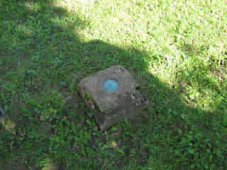 The conspicuous monument, projecting about 5 inches.