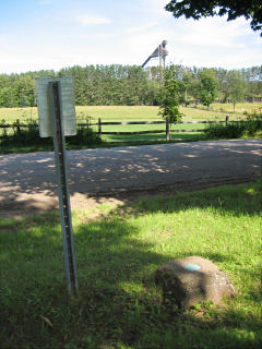 Looking E toward John Brown Road. A “Friendly Giant” is visible in the distance.